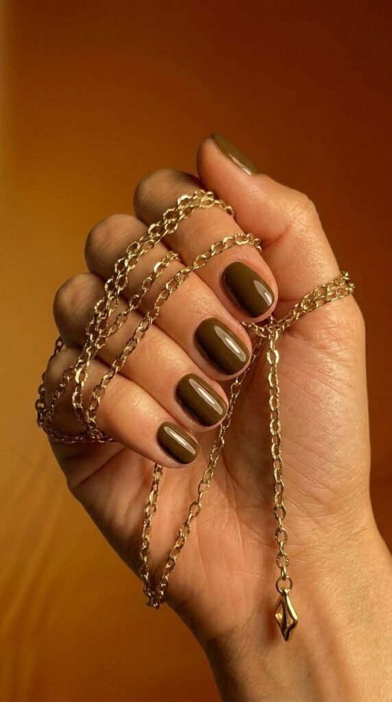 Sepia tone nail art for fall nail trends 2026 with jelly and ombre finish options
