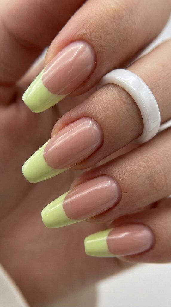Lime green French tip almond nails with high gloss finish for summer 2026