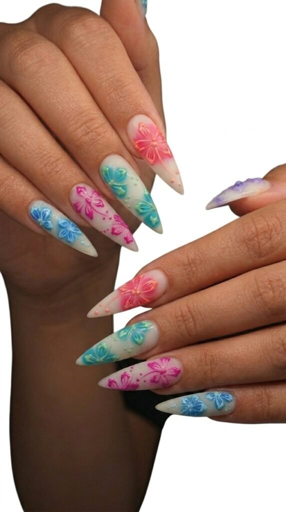 Milky white stiletto nails with 3D floral aura effect for summer 2026