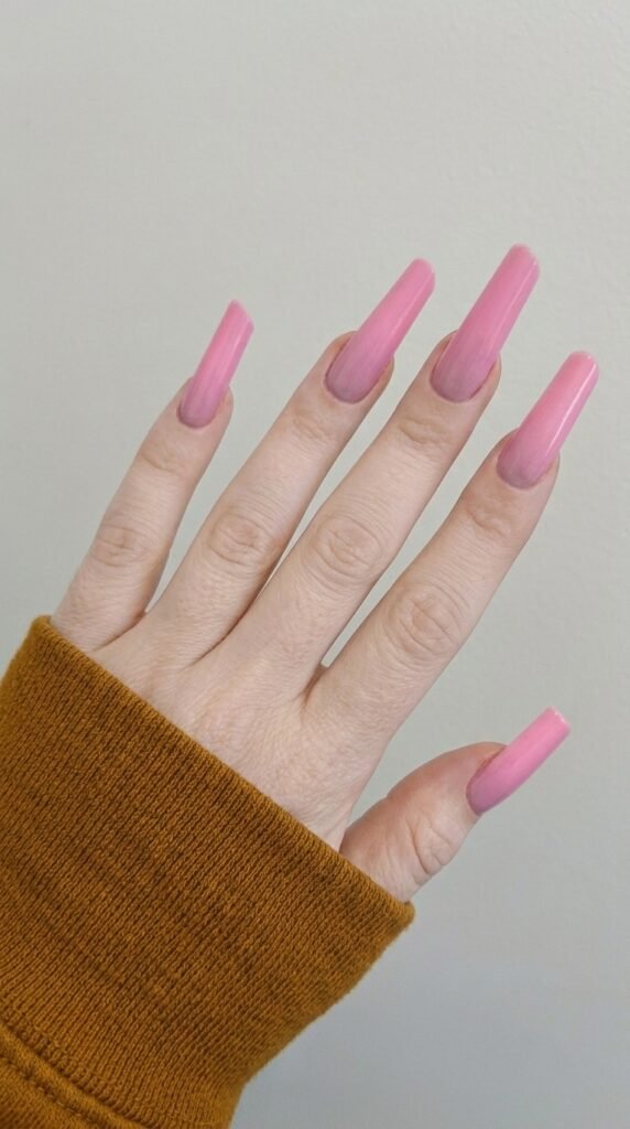 Vibrant bubblegum pink coffin ombre nails with nude to pink gradient for summer 2026